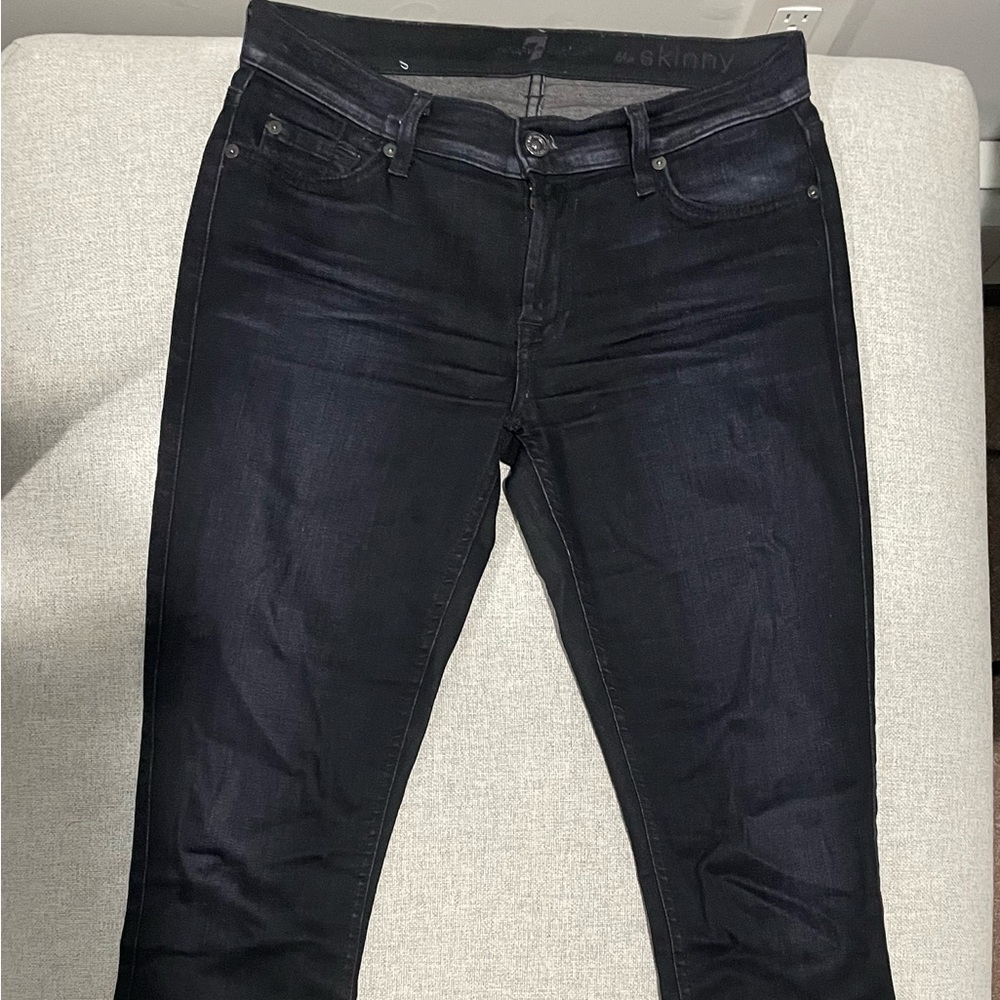 Size 27 the skinny seven jeans in dark almost black faded wash.